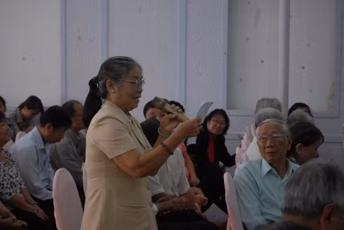 Cử tri Q.1, TP.HCM phát biểu tại buổi tiếp xúc của cử tri với Chủ tịch nước Trương Tấn Sang (ảnh: H.L)
