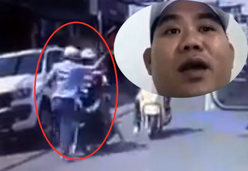 Khoảnh khắc người phụ nữ chở theo con nhỏ bị tát và ông Nguyễn Thanh Tuấn. (Ảnh chụp màn hình từ clip)