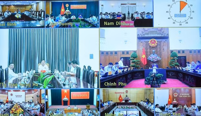 Hội nghị được tổ chức theo hình thức trực tuyến tại điểm cầu trụ sở Chính phủ với điểm cầu 9 tỉnh có dự án đi qua. Ảnh: VGP/Nhật Bắc