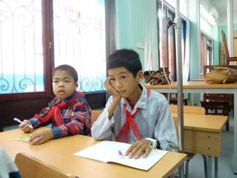 Em Vũ Văn Hưởng, 12 tuổi: "Anh Nick thật giỏi và phi thường" (Ảnh Thu Hòe)