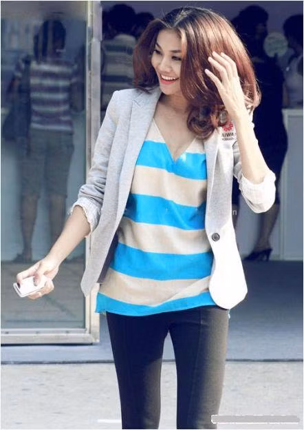 Blazer cotton khiến Thanh Hằng trở nên năng động và trẻ trung hơn dưới ánh nắng dịu của mùa thu.
