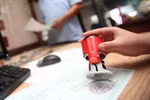 Cảnh giác thủ đoạn sử dụng con dấu, tài liệu giả để lừa doanh nghiệp