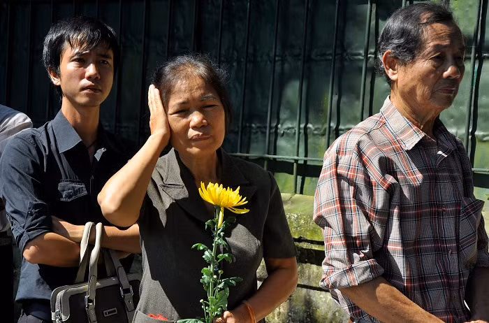 Những nét mặt xót thương trước mất mát của cả dân tộc Những nét mặt xót thương trước mất mát của cả dân tộc