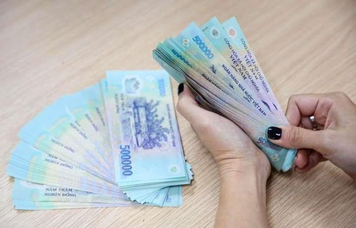 Lương tháng 13 đối với giáo viên rất khó để thực hiện. (Ảnh minh họa: TTXVN)