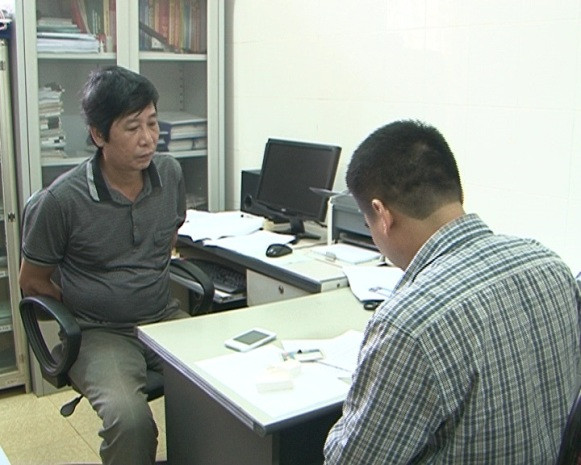 Đối tượng Đỗ Tiến Chi tại cơ quan công an