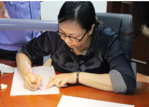 Bà Nguyễn Thị Thanh Vân - đối tượng liên quan tới vụ việc vừa được triệu tập để làm rõ hành vi vi phạm pháp luật. Ảnh: Người Lao Động