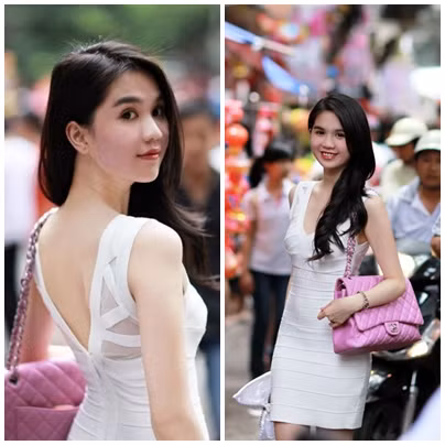 Trang phục dạo phố màu trắng của Ngọc Trinh có vẻ kín đáo hơn, nhưng vẫn đủ gợi cảm và lôi cuốn.