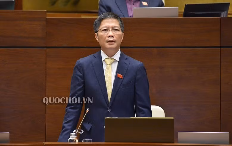 Bộ trưởng Trần Tuấn Anh trả lời chất vấn tại Quốc hội. ảnh: quochoi.vn