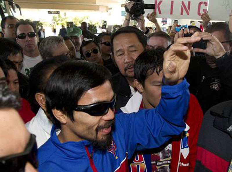 Tay đấm người Phillippine Manny Paquiao có mặt tại Las Vegas để thách đấu với tay đấm bất bại Floyd Mayweather. Kẻ chiến thắng sẽ nhận được 30 triệu USD
