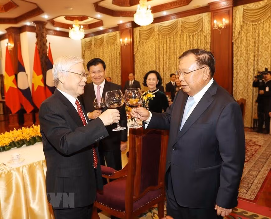 Tổng Bí thư, Chủ tịch nước Lào Bounnhang Vorachith chủ trì chiêu đãi trọng thể chào mừng Tổng Bí thư, Chủ tịch nước Nguyễn Phú Trọng và đoàn cấp cao Việt Nam. ảnh: TTXVN. Tổng Bí thư, Chủ tịch nước Lào Bounnhang Vorachith chủ trì chiêu đãi trọng thể chào mừng Tổng Bí thư, Chủ tịch nước Nguyễn Phú Trọng và đoàn cấp cao Việt Nam. ảnh: TTXVN.
