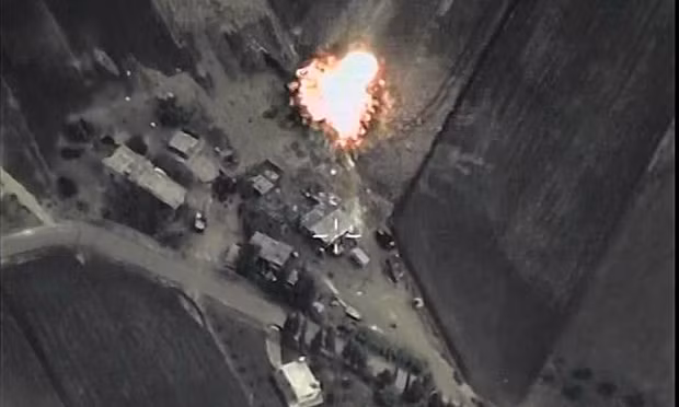 Nga không kích các mục tiêu của khủng bố IS tại Syria. Ảnh Guardian. Nga không kích các mục tiêu của khủng bố IS tại Syria. Ảnh Guardian.