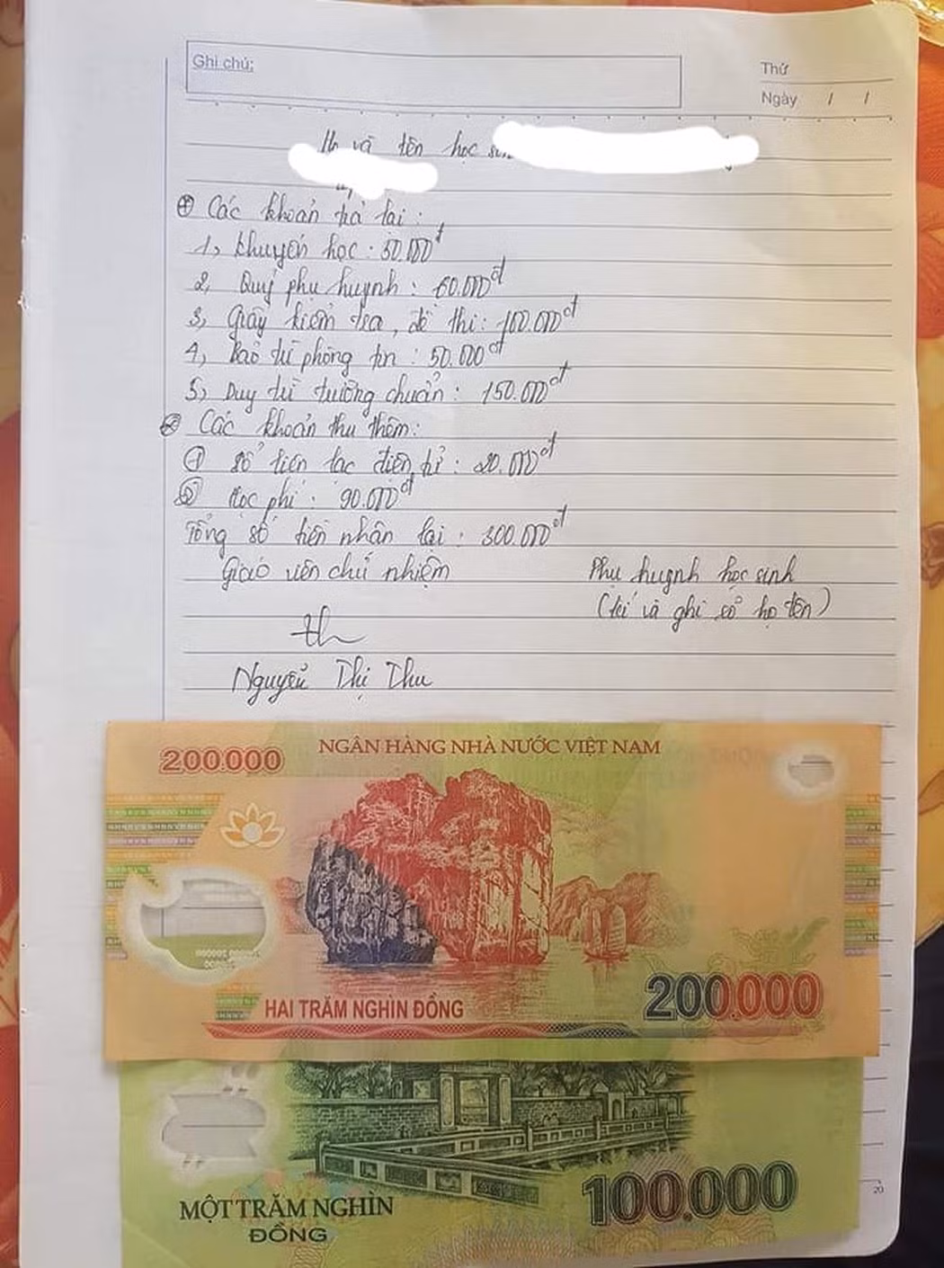 Phụ huynh cần tìm hiểu rõ quy định và pháp luật để không bị thu vô lý (Ảnh:V.N)