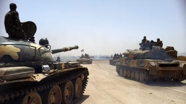 Quân chính phủ Syria và lực lượng vũ trang Hezbollah tiến vào thành Homs.