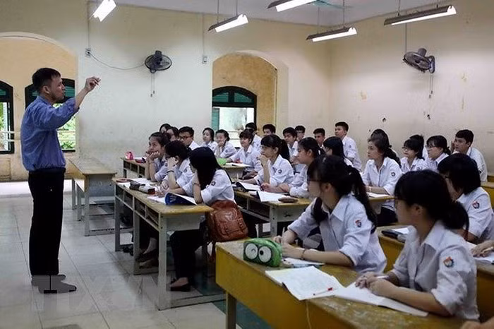 Chỉ tiêu thi đua, áp lực thành tích làm “tê liệt” giáo viên (Ảnh minh họa: TTXVN).