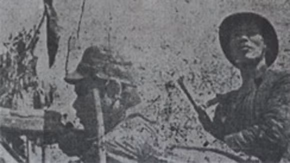 Bùi Nguyên Khiết (trái) trong cuộc chiến đấu bảo vệ biên giới phía Bắc năm 1979 (Ảnh tư liệu) Bùi Nguyên Khiết (trái) trong cuộc chiến đấu bảo vệ biên giới phía Bắc năm 1979 (Ảnh tư liệu)