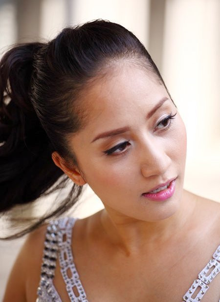Kiện tướng dance sports Khánh Thi - người từng ngồi ghế nóng Bước nhảy hoàn vũ 2010, 2012