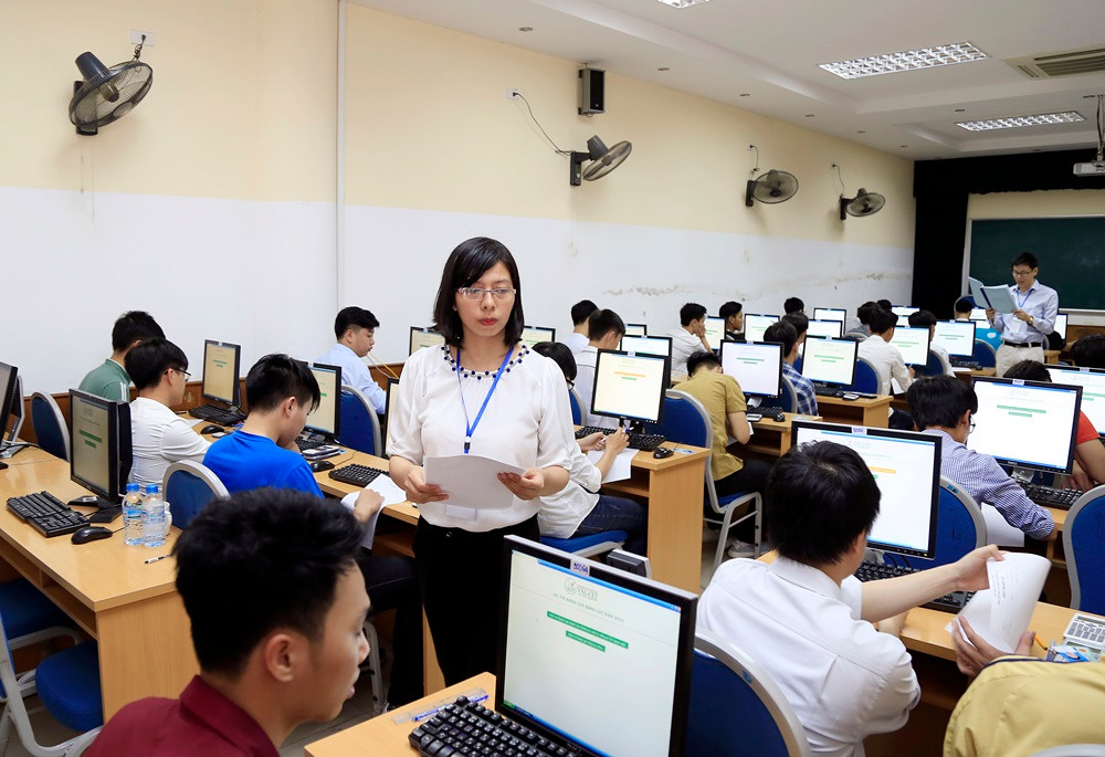 Trong phòng thi đánh giá năng lực. Ảnh Bùi Tuấn/VNU Trong phòng thi đánh giá năng lực. Ảnh Bùi Tuấn/VNU