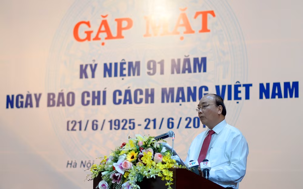 Thủ tướng Nguyễn Xuân Phúc trong buổi gặp mặt những người làm báo. Ảnh Xuân Trung