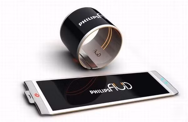 9. Điện thoại đeo tay Philips Fluid Chiếc điện thoại này ấn tượng bởi kiểu dáng thời trang và tiện dụng , có thể uốn thành chiếc vòng đeo tay độc đáo. Với màn hình OLED tiên tiến, Pilips Fluid thông minh có thể sẽ là bước tiến vượt bậc trong thị trường điện thoại cũng như ngành công nghiệp thời trang. 9. Điện thoại đeo tay Philips Fluid Chiếc điện thoại này ấn tượng bởi kiểu dáng thời trang và tiện dụng , có thể uốn thành chiếc vòng đeo tay độc đáo. Với màn hình OLED tiên tiến, Pilips Fluid thông minh có thể sẽ là bước tiến vượt bậc trong thị trường điện thoại cũng như ngành công nghiệp thời trang.