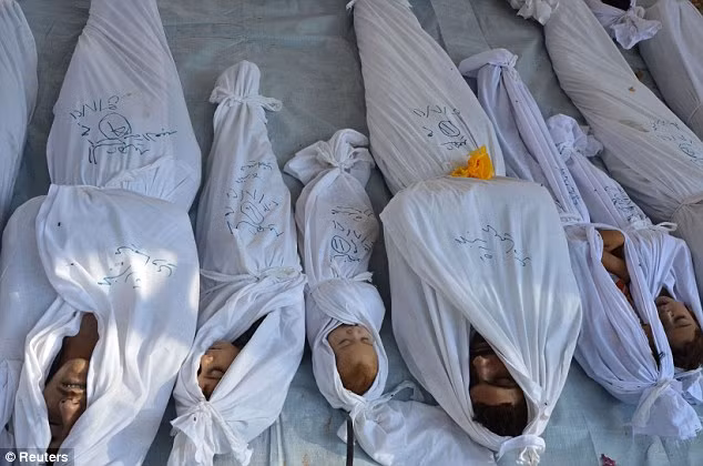 Các nạn nhân trong vụ cáo buộc quân đội Syria sử dụng vũ khí hóa học hôm 21/8. Các nạn nhân trong vụ cáo buộc quân đội Syria sử dụng vũ khí hóa học hôm 21/8.
