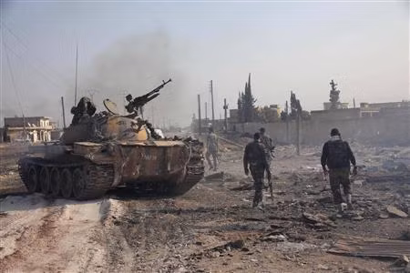Lực lượng ủng hộ Tổng thống Bashar al-Assad sau một trận giao tranh tại Aleppo.