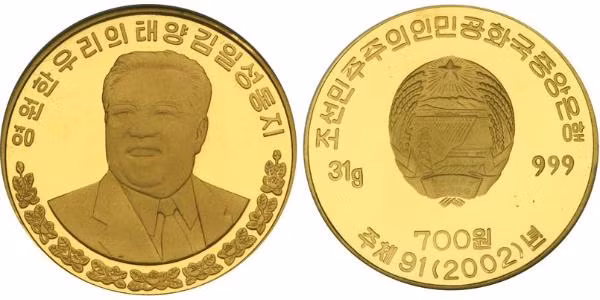 Một đồng tiền vàng Triều Tiên có hình ảnh của người sáng lập đất nước Kim Nhật Thành. Một đồng tiền vàng Triều Tiên có hình ảnh của người sáng lập đất nước Kim Nhật Thành.