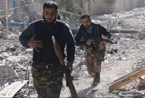Phiến quân Syria liên kết với al-Qaeda. Phiến quân Syria liên kết với al-Qaeda.