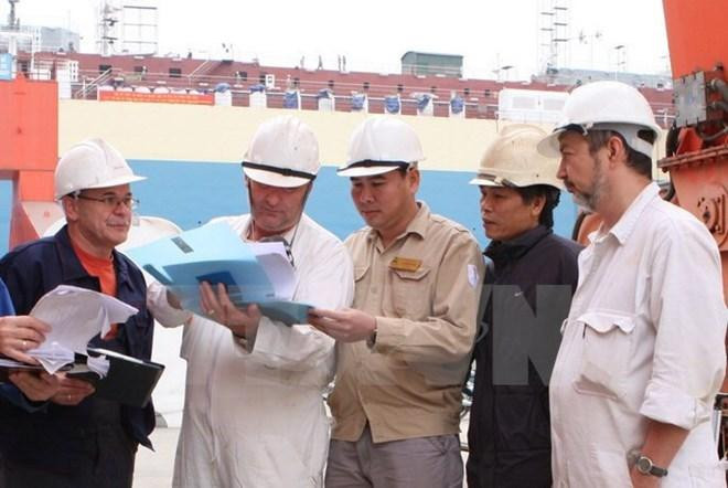 Quy định mới về người lao động nước ngoài làm việc tại Việt Nam. Ảnh minh họa: TTXVN Quy định mới về người lao động nước ngoài làm việc tại Việt Nam. Ảnh minh họa: TTXVN