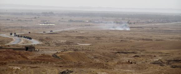 Đoàn xe của dân quân người Kurd di chuyển tới địa điểm chiến đấu với các tay súng ISIS ở ngoại ô Diyala ngày 14/6/2014. Đoàn xe của dân quân người Kurd di chuyển tới địa điểm chiến đấu với các tay súng ISIS ở ngoại ô Diyala ngày 14/6/2014.