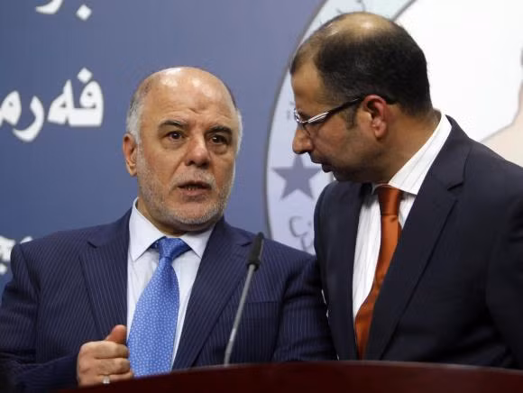 Tân Thủ tướng Iraq Maliki Haider al-Abadi (trái).