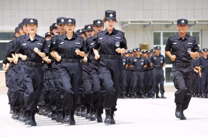Nữ cảnh sát Trung Quốc. Hình minh họa. Nữ cảnh sát Trung Quốc. Hình minh họa.