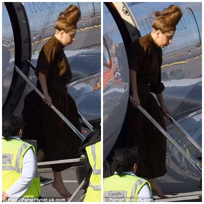 Trái với sự xuất hiện lộng lẫy và gây chú ý tại buổi trình diễn trên, hình ảnh Lady Gaga lúc ở sân bay thật kém “hấp dẫn” khi cô mới bay từ New York tới. Diện trang phục áo khá đơn giản màu sô cô la với điểm nhấn là búi tóc cao. Ảnh. FameFlynet.