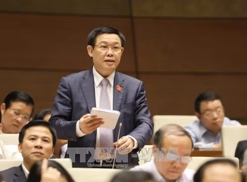Phó Thủ tướng Vương Đình Huệ khẳng định: "Không bao giờ có chủ trương phá giá đồng tiền để hỗ trợ cho xuất khẩu". ảnh: TTXVN.