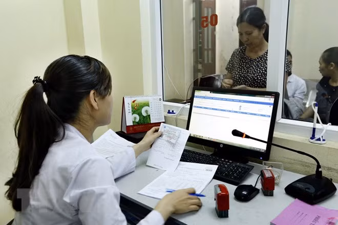 Tham gia bảo hiểm y tế là quyền lợi của mọi người dân. ảnh minh họa: TTXVN.