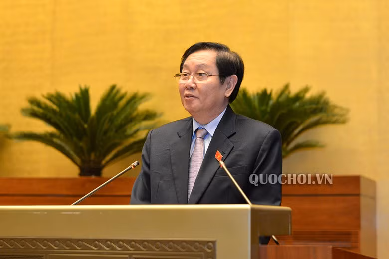 Bộ trưởng Nội vụ - ông Lê Vĩnh Tân trả lời chất vấn tại Quốc hội. Ảnh: quochoi.vn