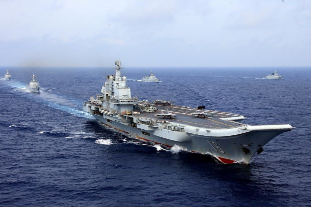 Tàu sân bay Liêu Ninh và các chiến hạm Trung Quốc tập trận, ảnh: The Star Online. Tàu sân bay Liêu Ninh và các chiến hạm Trung Quốc tập trận, ảnh: The Star Online.