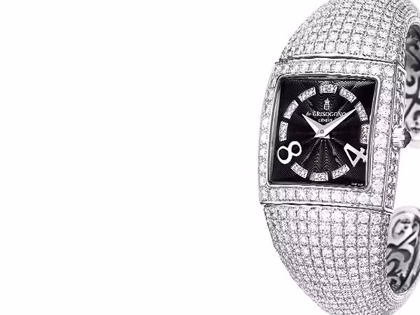 2. Piccolina Nằm trong bộ sưu tập của hãng De Grisogono, chiếc đồng hồ Piccolina được làm từ 18 carat vàng trắng, kim cương trắng và đá thạch anh. Mặt số màu đen được đính 20 viên kim cương trắng, vòng đeo tay làm từ vàng trắng được gắn tới 1.414 viên kim cương màu trắng 13,20 carat. Và đặc biệt, chiếc đồng hồ này có khả năng chịu nước lên đến 30 mét.
