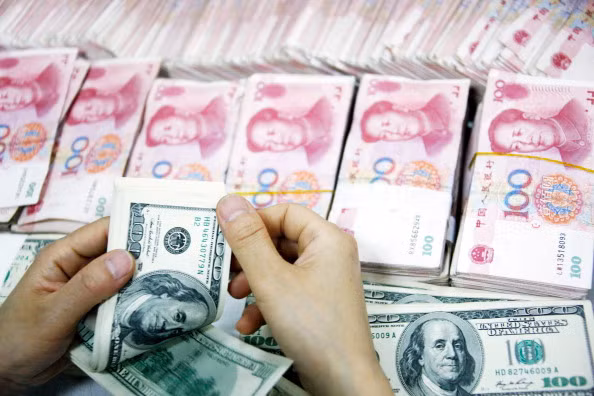 Việc Bắc Kinh xác định tiền tệ đóng vai trò chủ công thay cho hàng hoá sẽ giúp đồng CNY khẳng định sức mạnh cho kinh tế Trung Quốc như vai trò của đồng USD đối với kinh tế Mỹ. Ảnh minh họa: Internet.