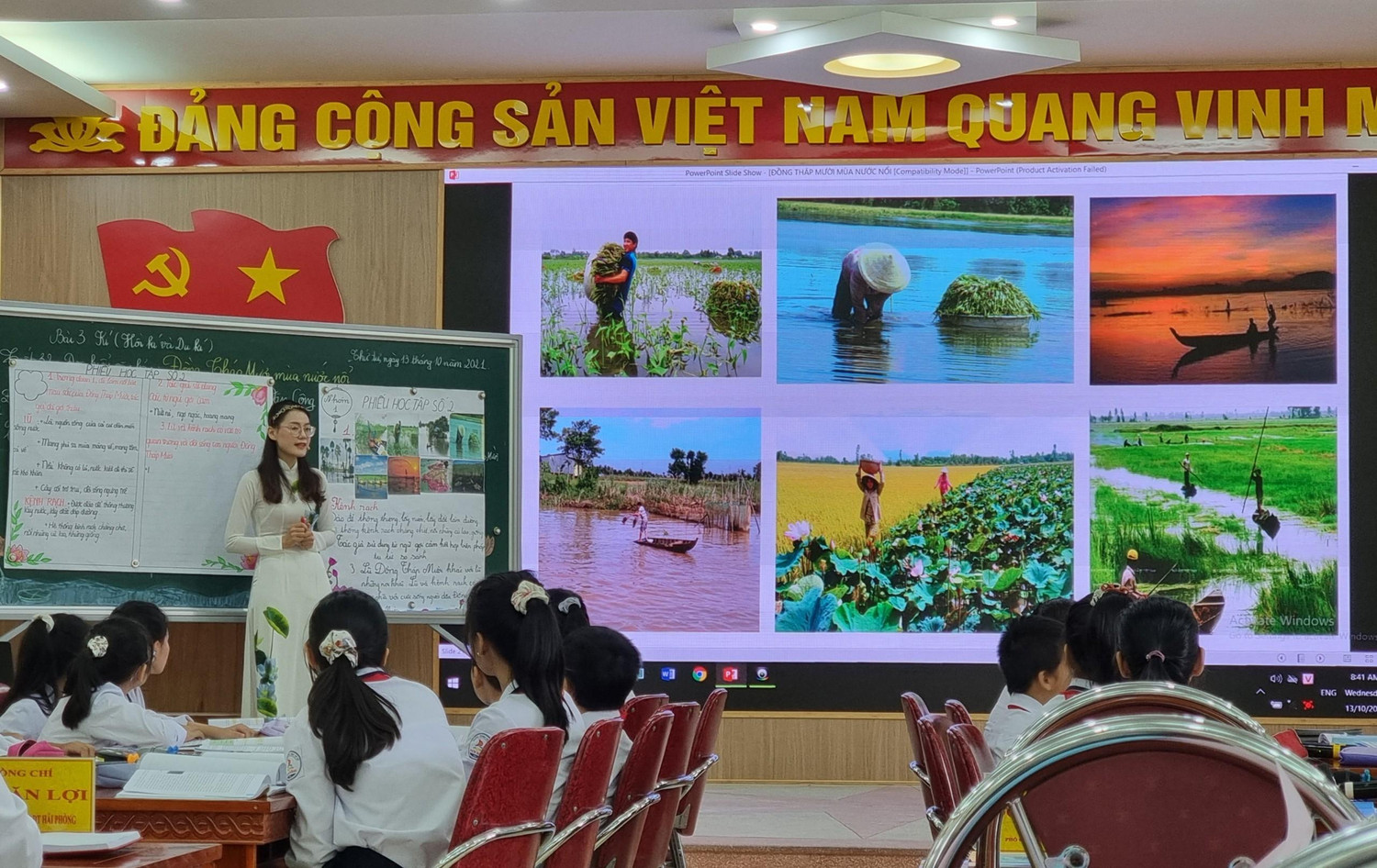 Cô giáo Thủy giới thiệu về đặc trưng vùng miền, nét đẹp văn hóa của Đồng Tháp Mười (Ảnh: Phương Linh)
