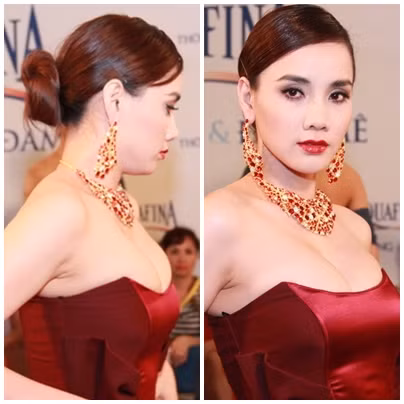 Trong một chương trình thời trang diễn ra gần đây, Trang Nhung xuất hiện trong chiếc đầm màu đỏ bordeaux cùng một bộ trang sức đính đá khá cồng kềnh, rối mắt. Trong một chương trình thời trang diễn ra gần đây, Trang Nhung xuất hiện trong chiếc đầm màu đỏ bordeaux cùng một bộ trang sức đính đá khá cồng kềnh, rối mắt.