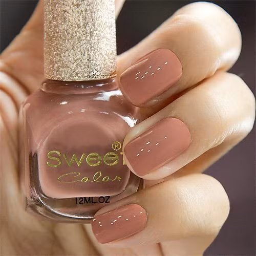 Màu chocolate cổ điển. Xem thêm: Nail xinh, điệu cho bạn gái / Bộ sưu tập váy xinh chào hè 2012.