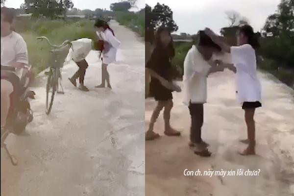 Nhóm nữ sinh có hành động hành hung, đe dọa nạn nhân phải xin lỗi. (Ảnh cắt từ clip)