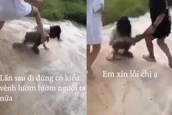 Nhóm nữ sinh đe dọa nạn nhân: "Lần sau đi đừng có kiểu vênh, lườm lườm người ta nữa" khiến nạn nhân sợ hãi. (Ảnh cắt từ clip)