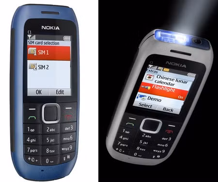 Nokia C1-00 (600 ngàn đồng): Ngoài tính năng hai SIM với 2 khe cắm ở dưới pin, model này còn có giắc cắm tai nghe 3,5 mm, đài FM và một đèn pin phía trên. Nokia C1-00 (600 ngàn đồng): Ngoài tính năng hai SIM với 2 khe cắm ở dưới pin, model này còn có giắc cắm tai nghe 3,5 mm, đài FM và một đèn pin phía trên.