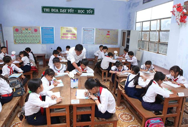 Vấn đề cải cách tiền lương mới cho giáo viên (Ảnh minh họa: TTXVN). Vấn đề cải cách tiền lương mới cho giáo viên (Ảnh minh họa: TTXVN).