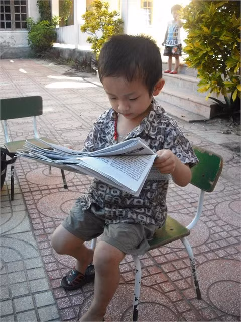 Đa số trẻ em đều thích đọc báo (Ảnh minh họa) Đa số trẻ em đều thích đọc báo (Ảnh minh họa)