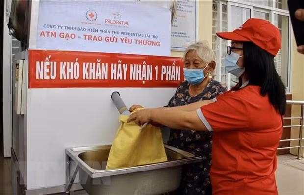 ATM gạo tại thành phố Long Xuyên. (Ảnh: Thanh Sang/TTXVN) ATM gạo tại thành phố Long Xuyên. (Ảnh: Thanh Sang/TTXVN)