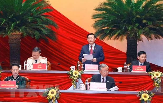 Ông Vương Đình Huệ, Ủy viên Bộ Chính trị, Bí thư Thành ủy Hà Nội thay mặt Đoàn Chủ tịch điều hành phiên họp sáng 28/1. (Ảnh: TTXVN)