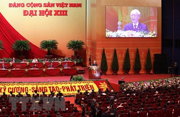 Đại hội nghe Tổng Bí thư Ban Chấp hành Trung ương Đảng, Chủ tịch nước Cộng hòa Xã hội Chủ nghĩa Việt Nam Nguyễn Phú Trọng đọc Báo cáo chính trị của Ban Chấp hành Trung ương Đảng khóa XII và các văn kiện trình Đại hội. (Ảnh: TTXVN)