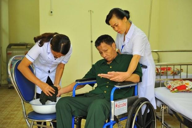 Các thương binh nặng, người có công với cách mạng tập phục hồi chức năng. (Ảnh: Anh Tuấn/TTXVN) Các thương binh nặng, người có công với cách mạng tập phục hồi chức năng. (Ảnh: Anh Tuấn/TTXVN)
